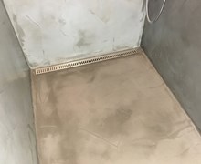 Microcement i 2 badeværelser i Nyborg