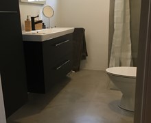 Microcement i badeværelse ved Nyborg