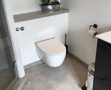 Microcement i badeværelse i Odense