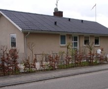Vandskuring af hus i Odense