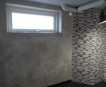 Flisearbejde og tyndpudsning af vægge i forbindelse med nyt badeværelse i Brenderup.